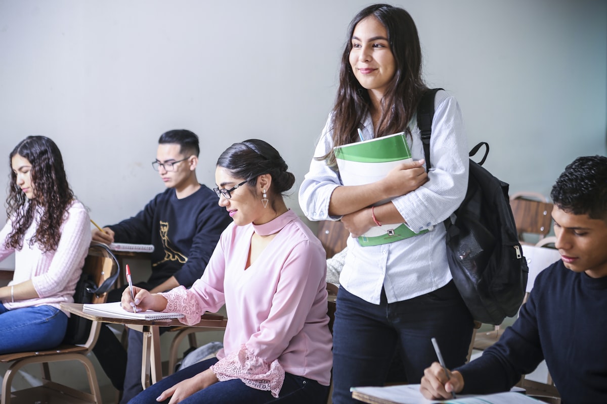 High school students studying together in a focused classroom